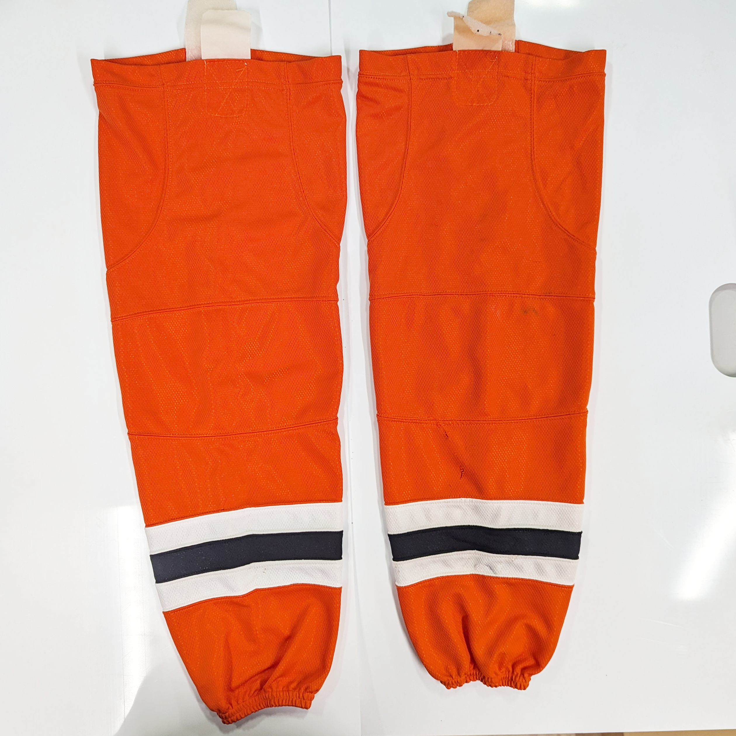 NCAA - Chaussettes de hockey usagées (orange/blanc/noir)